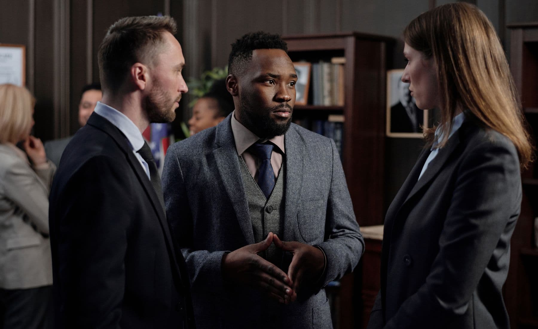 Business leaders having a serious personnel discussion in an office.